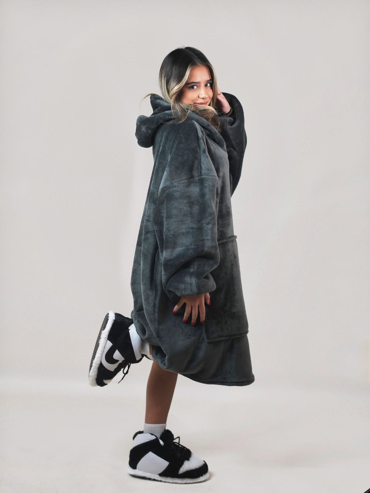 Cozy Black hoodie blanket in black, Lifestyle View - Cozify Lebanon